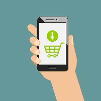 Online shopping and e-commerce concept with mobile app. Hand holding smartphone.